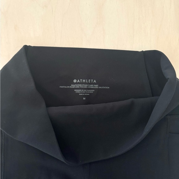 Athleta Salutation Stash flare pant black Medium - Picture 4 of 9